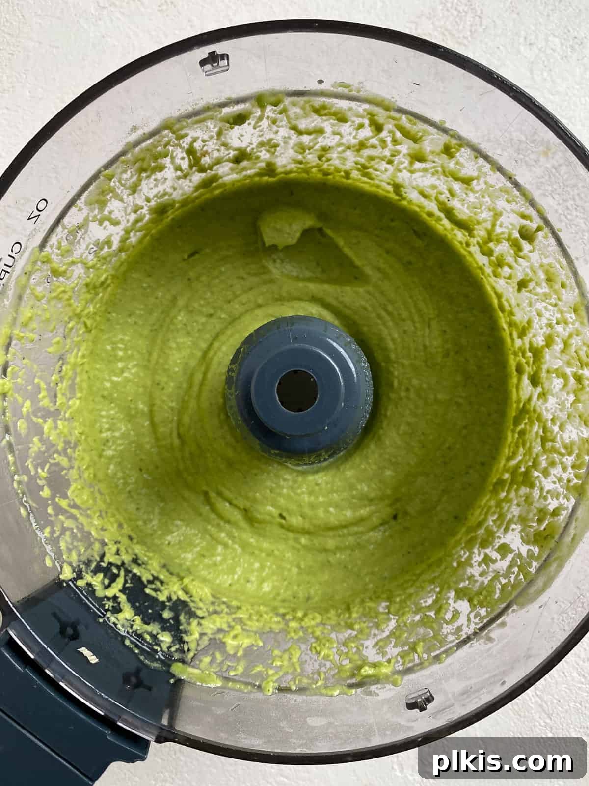 Effortless Avocado Cream 5 Process shot showing blended avocado cream in food processor.