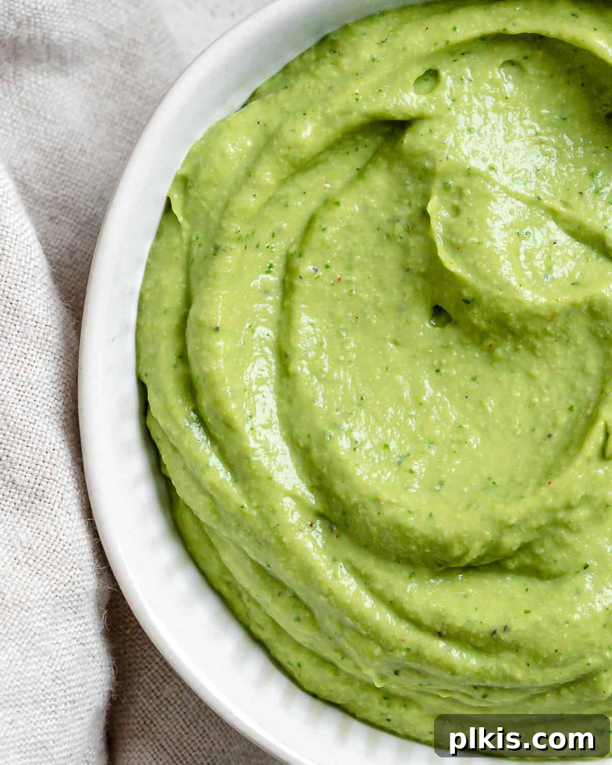 Effortless Avocado Cream 6 Completed Avocado Cream in a white bowl.