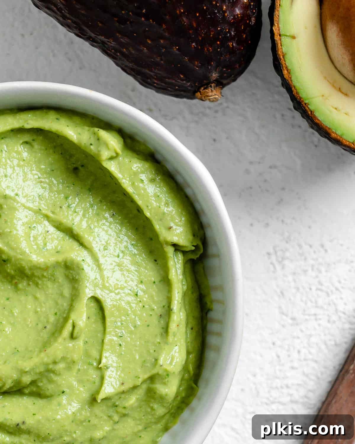 Effortless Avocado Cream 7 Completed Avocado Cream in a white bowl.
