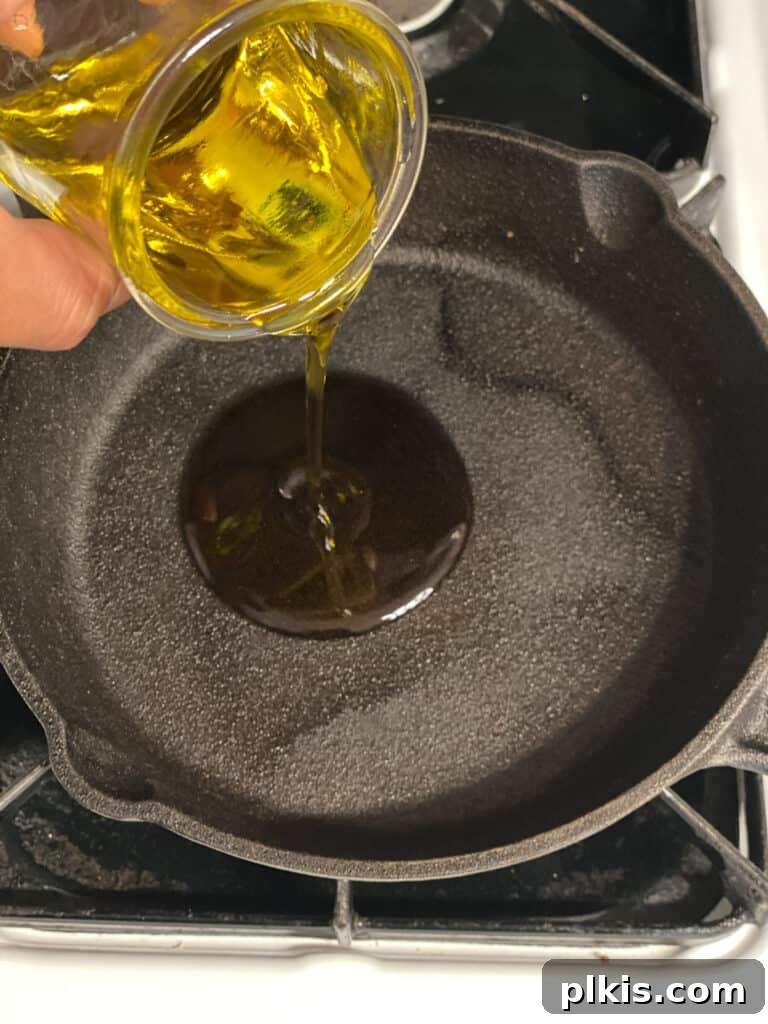 Plant-Powered Bean Dip 5 process shot of adding oil to pan