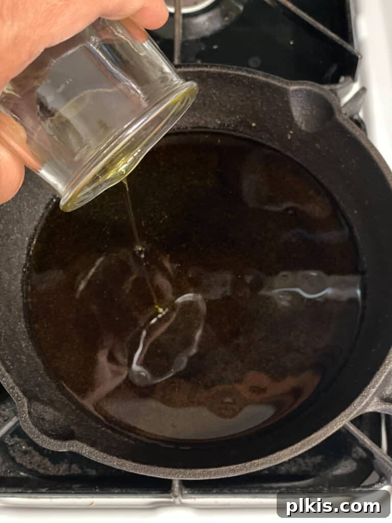 Plant-Powered Bean Dip 6 process shot of adding oil to pan
