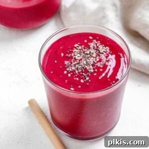 Completed Banana Beet Smoothie in a glass cup against a light background