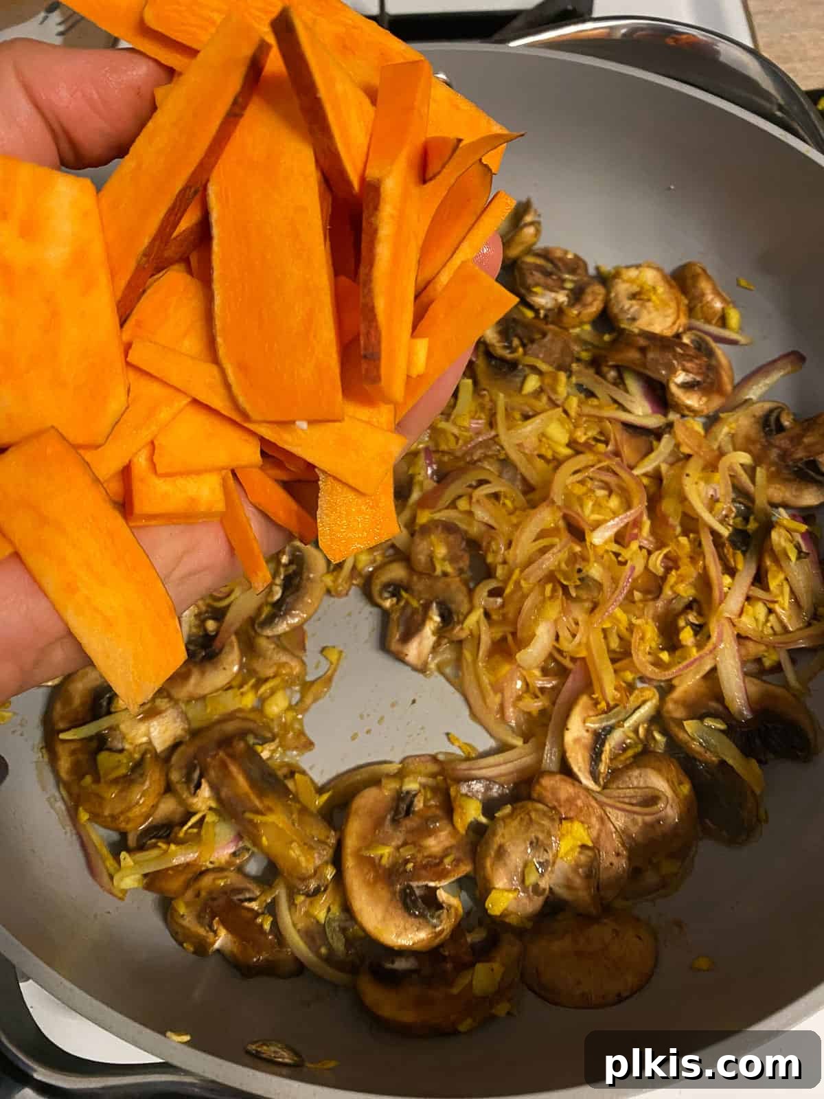 Nourishing Sweet Potato Fried Rice 10 Thinly sliced sweet potatoes added to the pan with other vegetables.