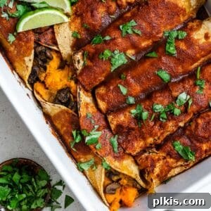 completed Sweet Potato Enchiladas in a baking dish