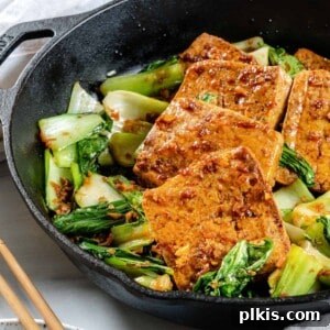 Sweet and Spicy Tofu Stir-Fry 12 completed Spicy and Sweet Tofu in iron skillet