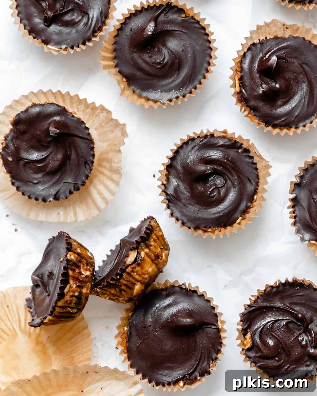 Chilled Peanut Butter Perfection 9 Another appealing shot of completed No-Bake Peanut Butter Cups, highlighting their uniform size and tempting chocolate layer, arranged on a white surface for a clean, professional look.