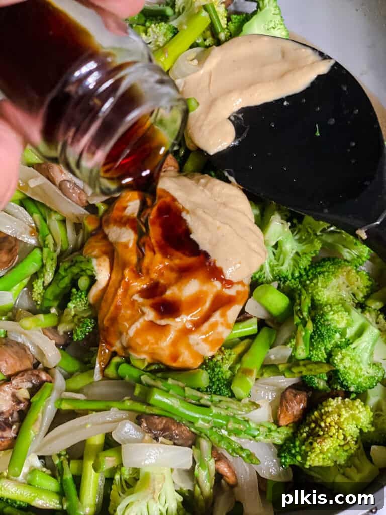 Velvet Rice Noodle Stir Fry 14 process shot of adding agave syrup to pan