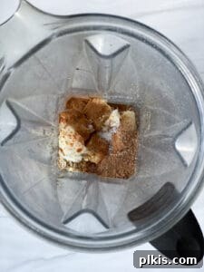 process of adding Chocolate Chip Banana Bites ingredients to food processor