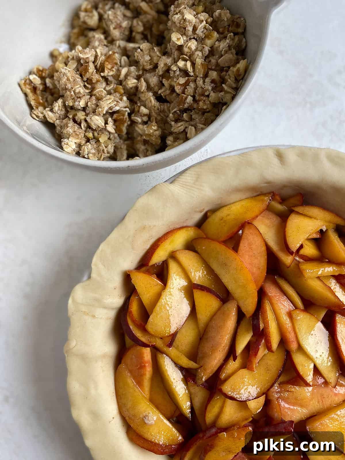 pre baked pie alongside a bowl of crumbs