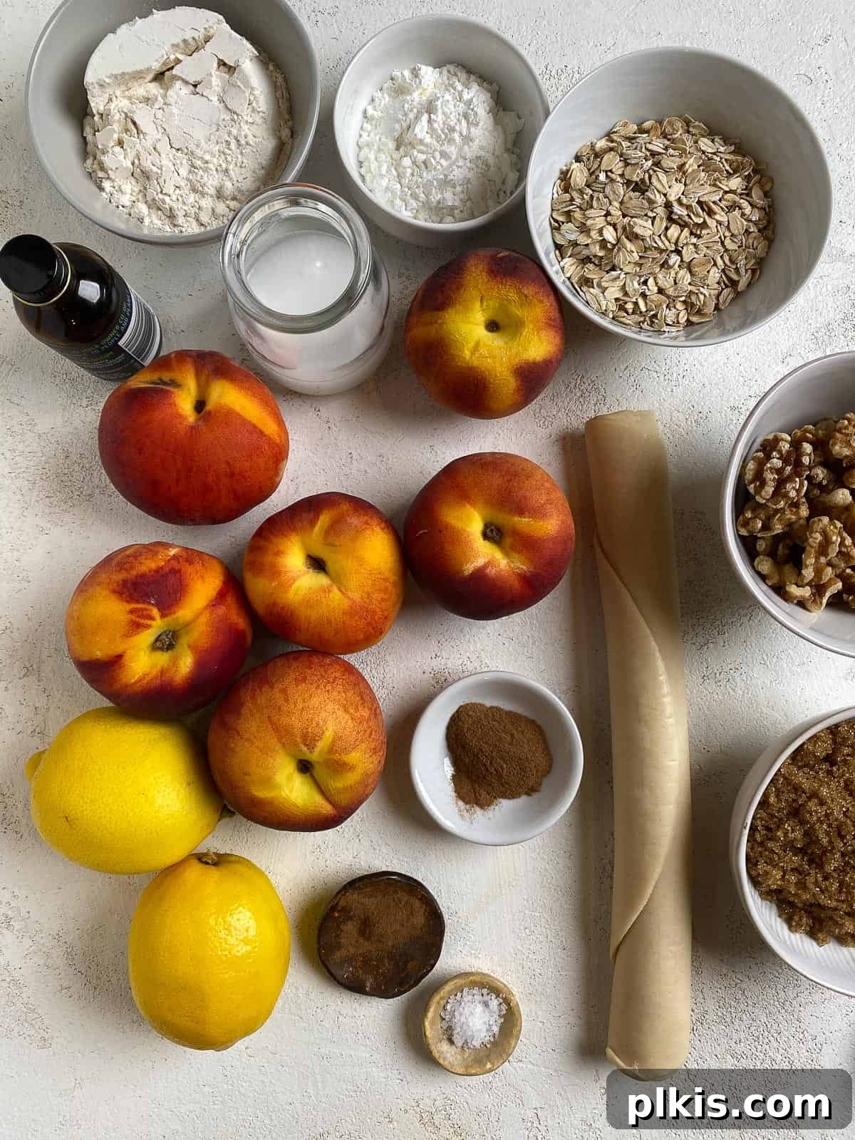 ingredients for Peach Crumb Pie against a white background