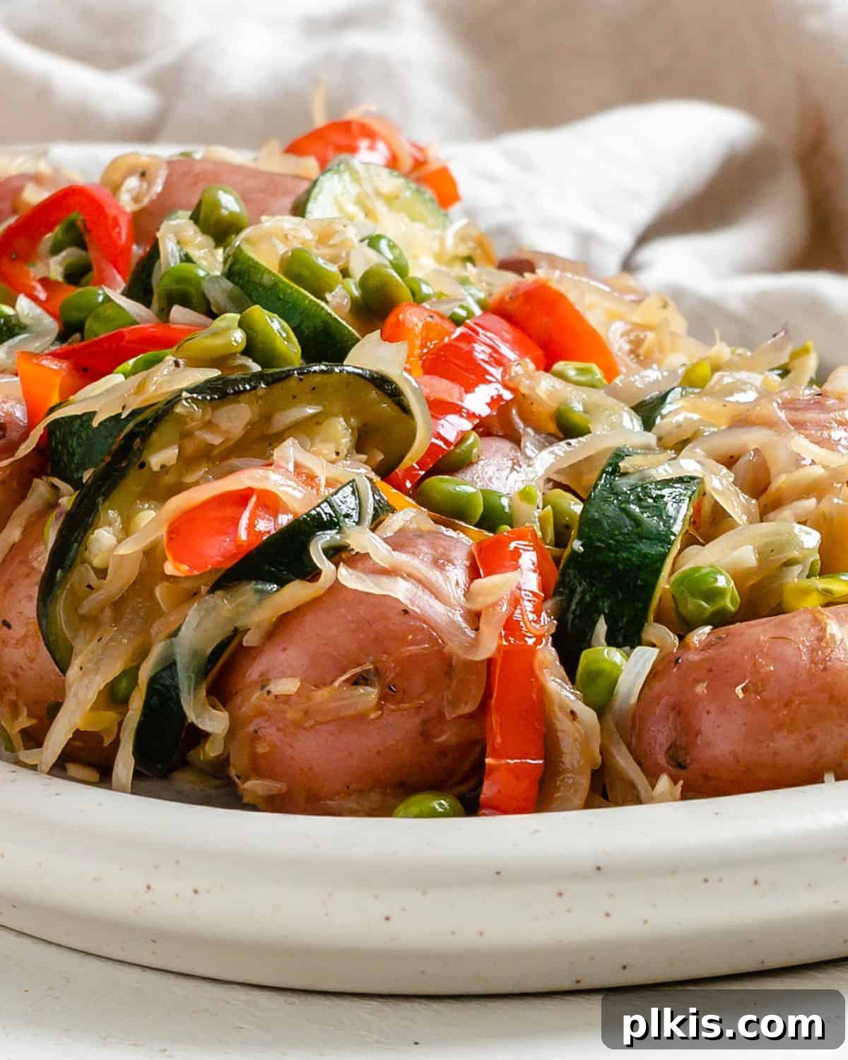Vibrant Vegetable Sauté with Golden Baby Potatoes 12 A beautifully plated dish of Sautéed Mixed Vegetables with Baby Potatoes on a white platter, highlighting its colorful and healthy appeal.