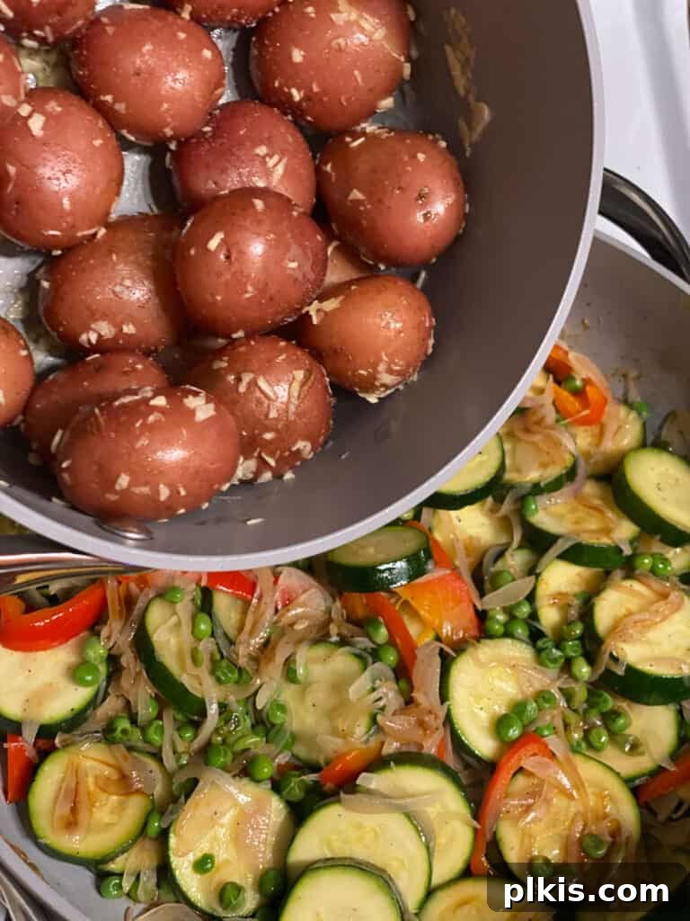 Vibrant Vegetable Sauté with Golden Baby Potatoes 10 Close-up of the finished Sautéed Mixed Vegetables and Baby Potatoes plated.