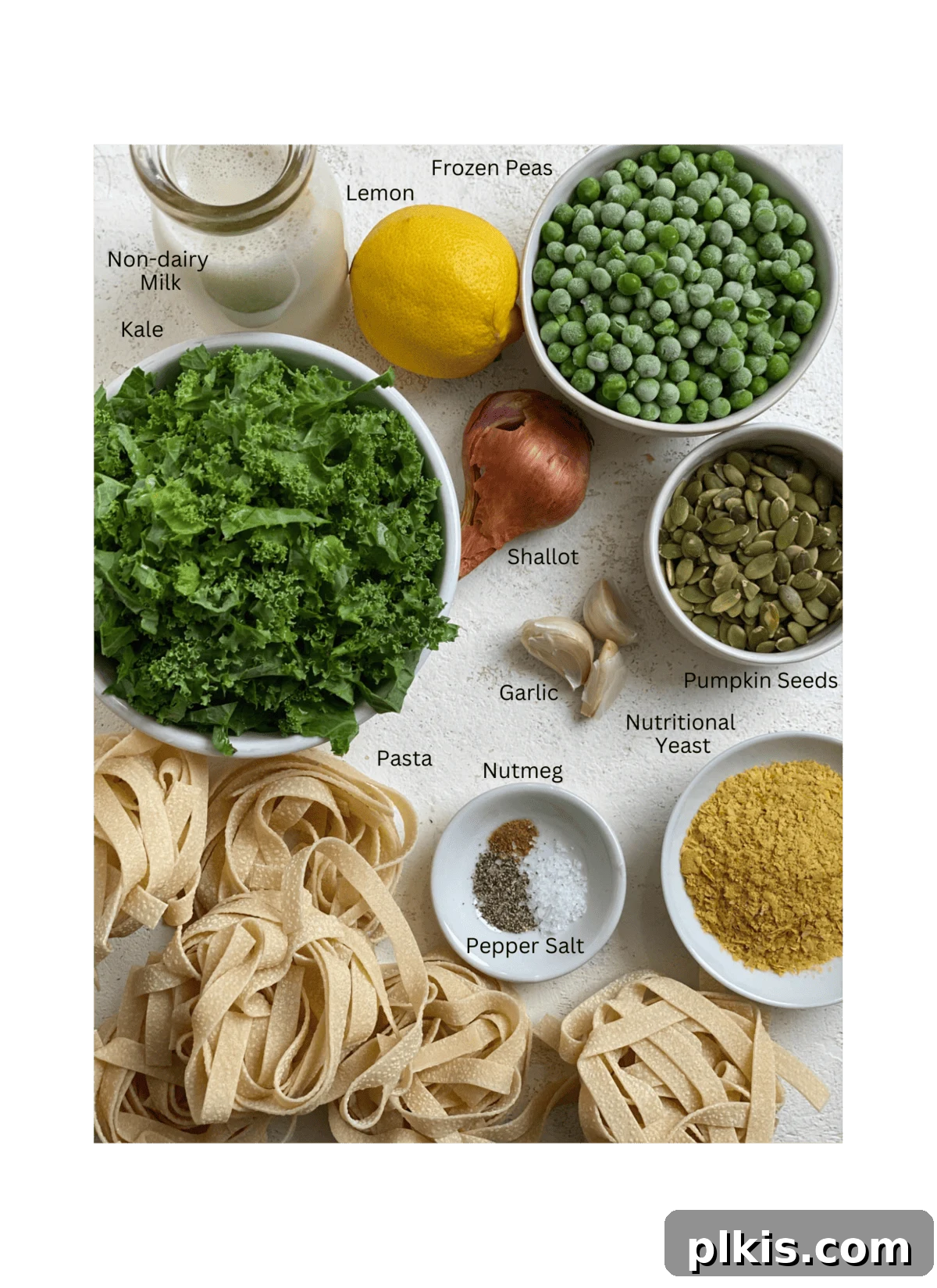 Green Goodness Alfredo 3 ingredients for Dairy Free Alfredo Sauce with Kale and Peas measured out against a white surface