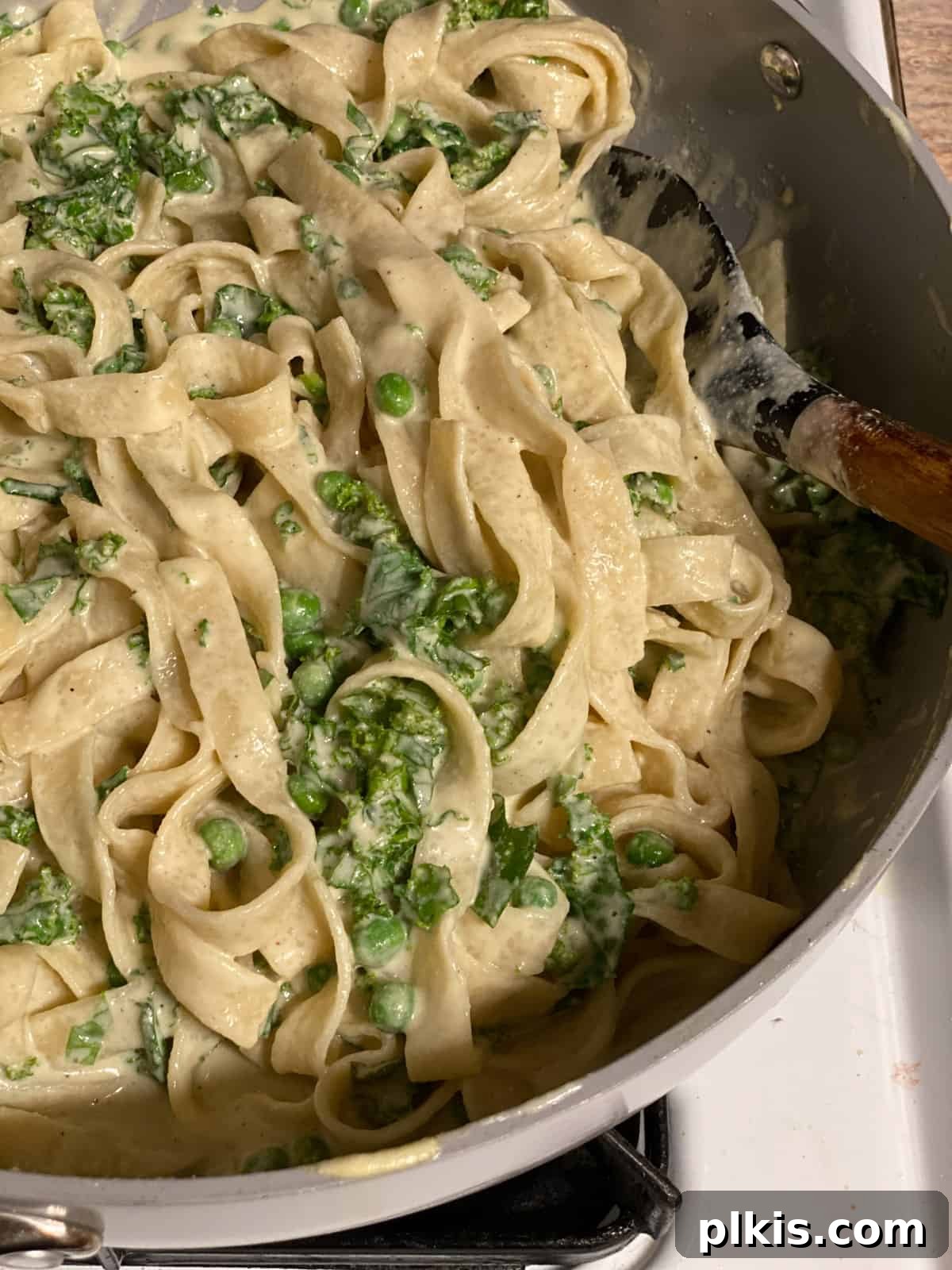 Green Goodness Alfredo 6 process shot of Dairy Free Alfredo Sauce with Kale and Peas cookin gin pot