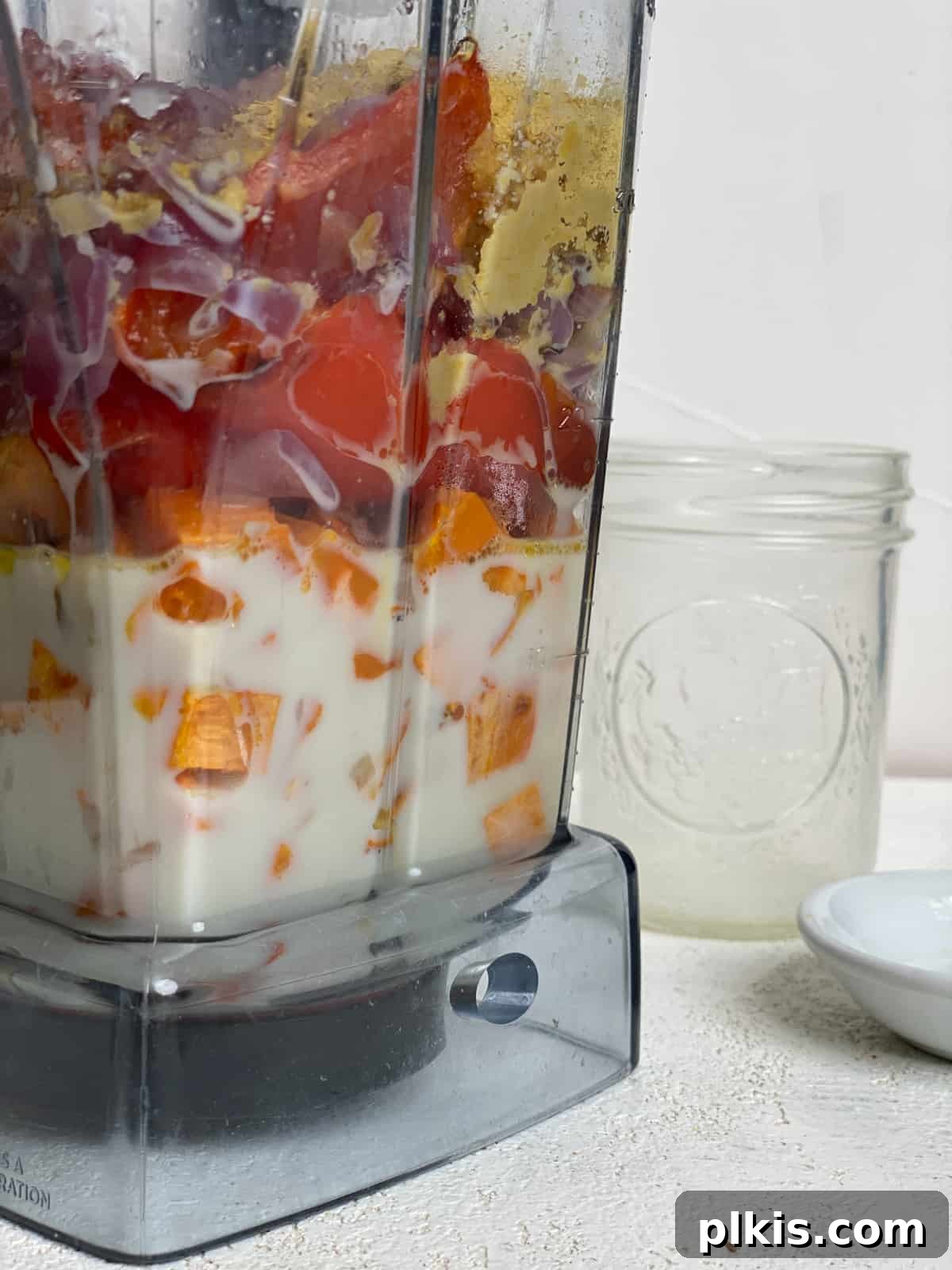 Velvety Sweet Potato Spaghetti 12 Blender with smooth, creamy sweet potato pasta sauce against a light background