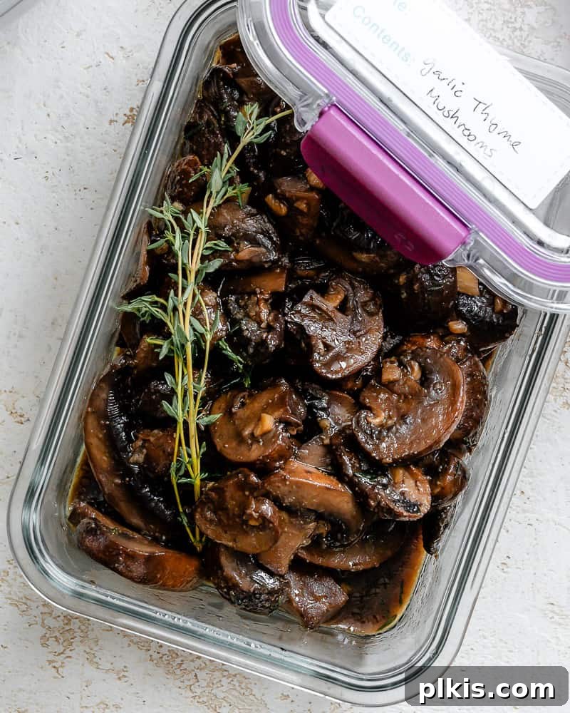 Sizzling Garlic Thyme Mushrooms 11 Sauteed Mushrooms with Garlic and Thyme in a small bowl