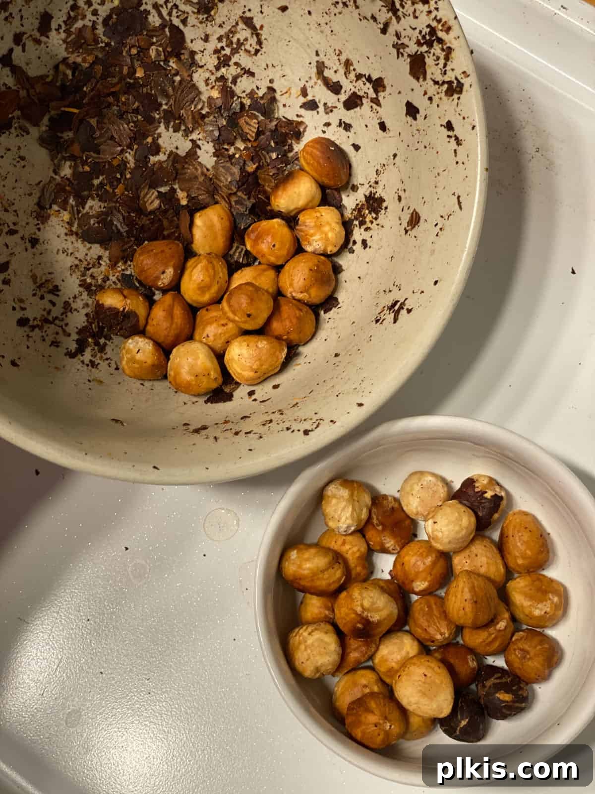 Golden Roasted Delicata Sweet Potato Soup 13 Process of removing skins from toasted hazelnuts