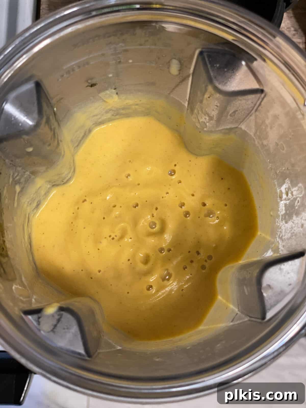 Golden Roasted Delicata Sweet Potato Soup 15 Process shot post blending ingredients in a high-speed blender for soup