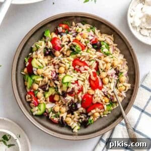 Zesty Lemon Orzo Salad 10 Completed Easy Lemon Orzo Salad in a bowl.