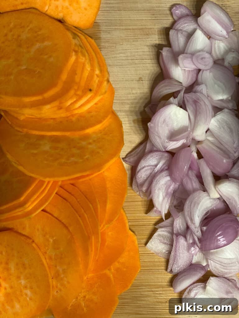 A combined close-up shot of thinly sliced sweet potatoes and chopped shallots on a cutting board, emphasizing their uniform preparation.