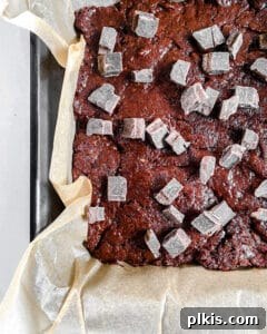Heavenly Vegan Brownies 7 process of Super Fudgy Vegan Brownies prepared on parchment paper, batter in the pan before baking
