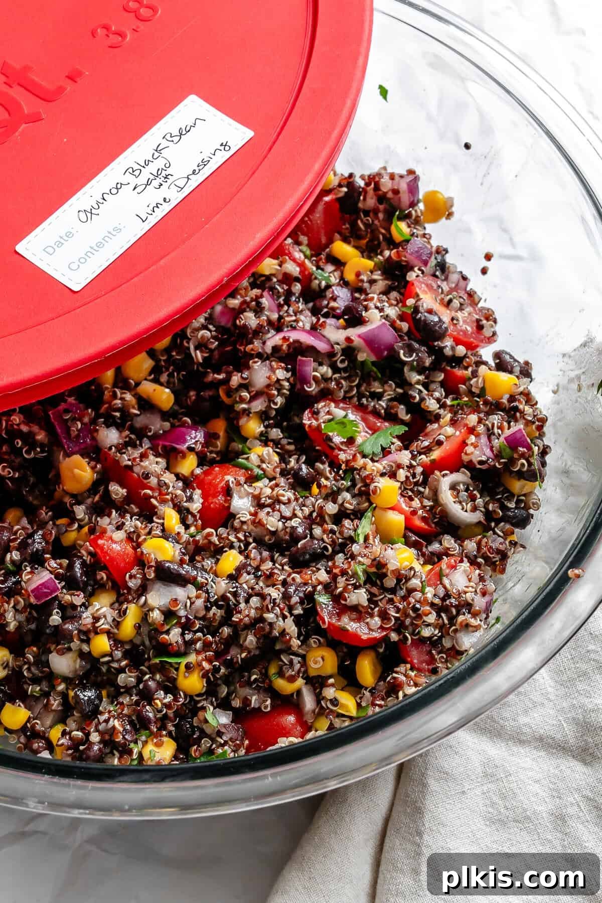 Southwestern Quinoa and Black Bean Fiesta 9 Completed Black Bean Quinoa Salad in a storage container, showcasing it as a perfect meal prep option.