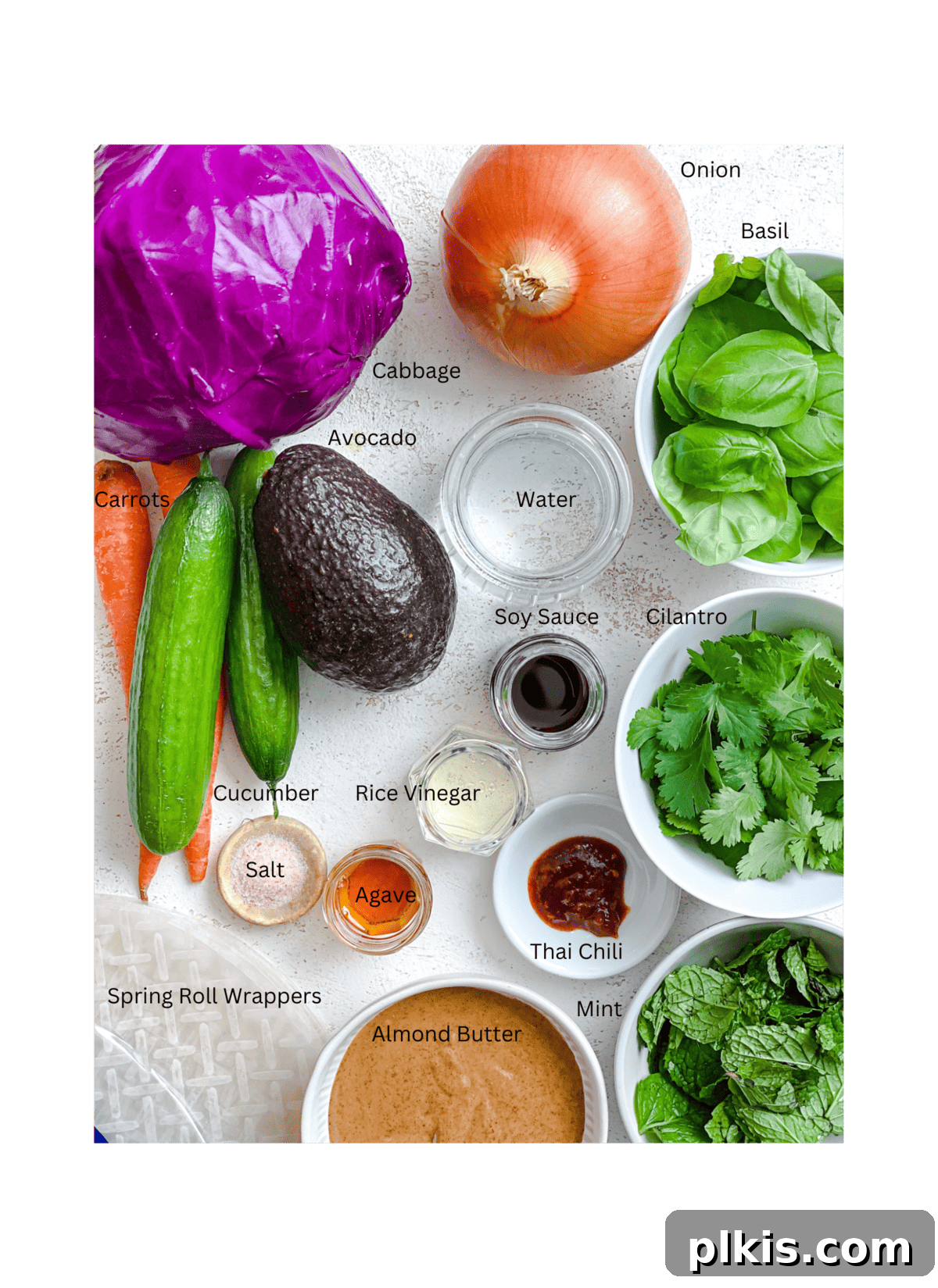 Vibrant Rainbow Rolls with Creamy Almond Shallot Dip 3 Precisely measured ingredients for Fresh Rainbow Rolls with Almond Shallot Sauce, neatly arranged on a clean white surface, ready for preparation.