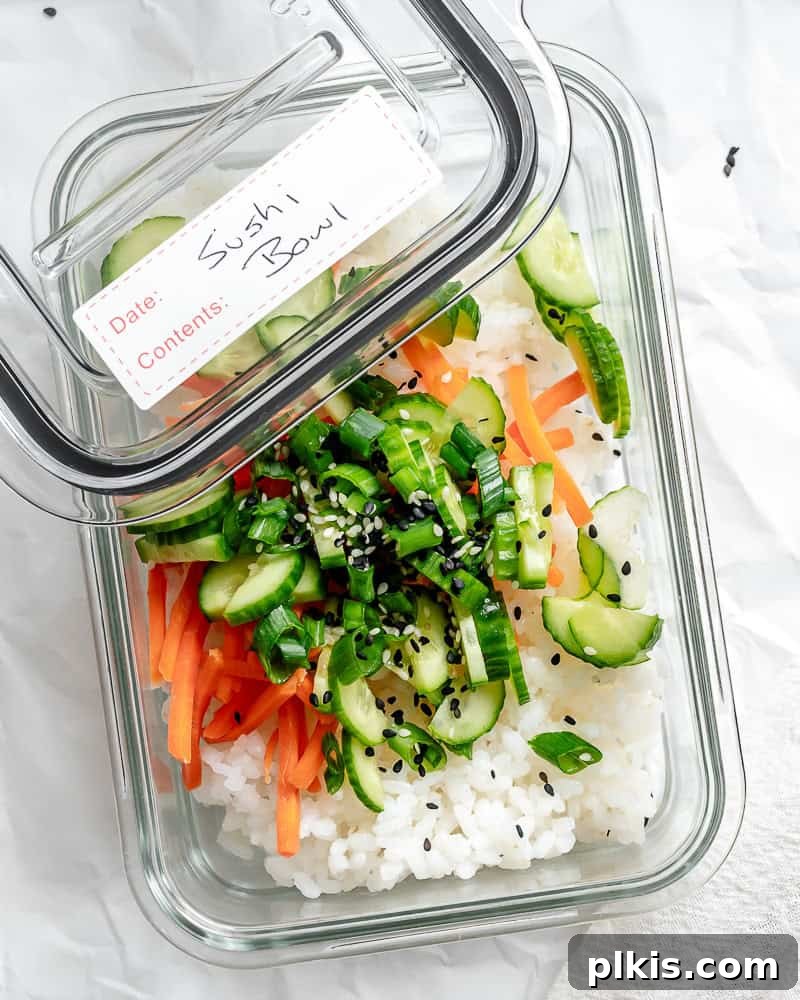 Unrolled Sushi 10 A leftover vegan sushi bowl stored neatly in a clear glass container, ready for meal prep or a later meal.