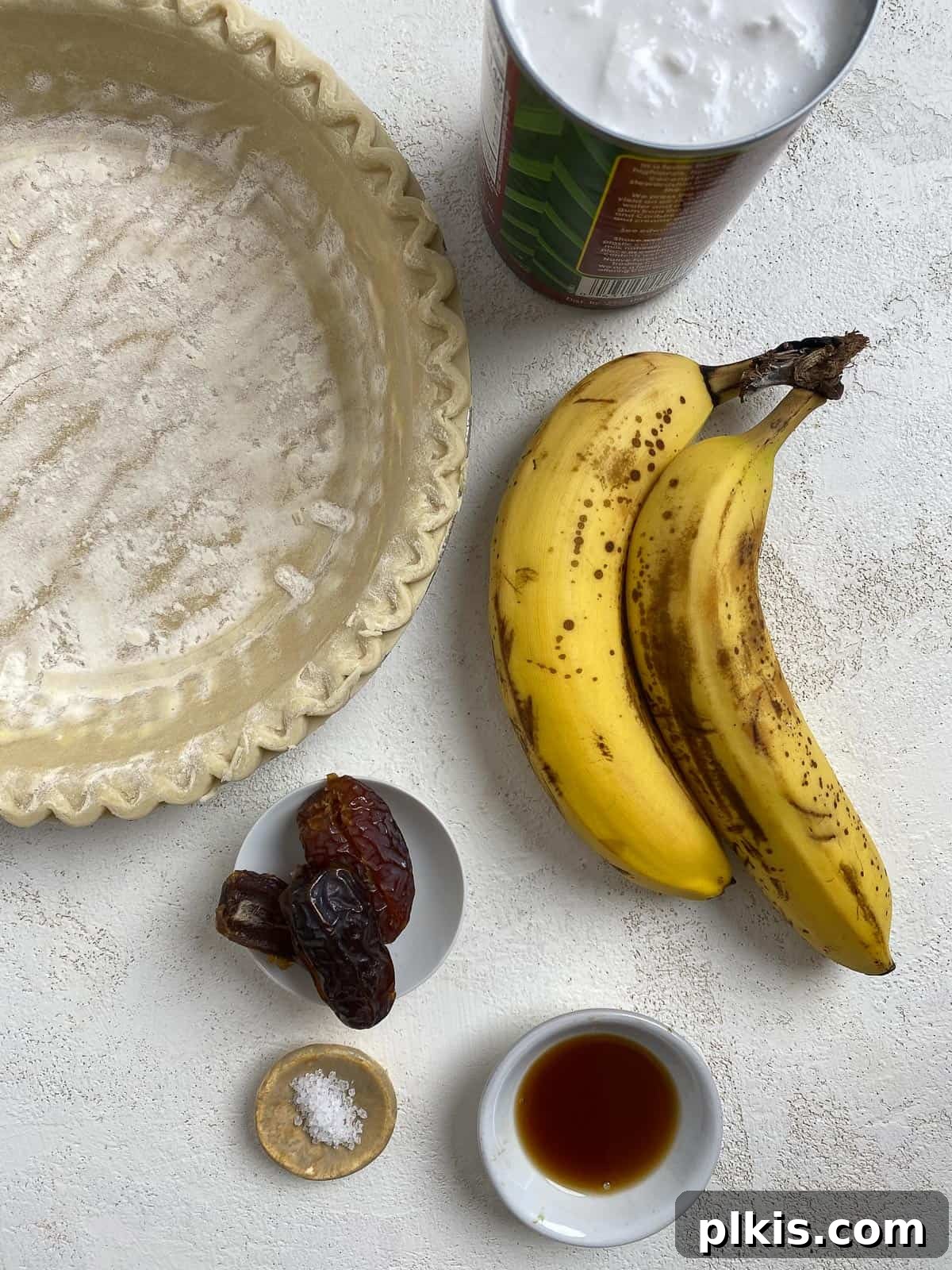 Velvet Vegan Banana Cream Pie 3 ingredients for Vegan Banana Cream Pie against a white surface