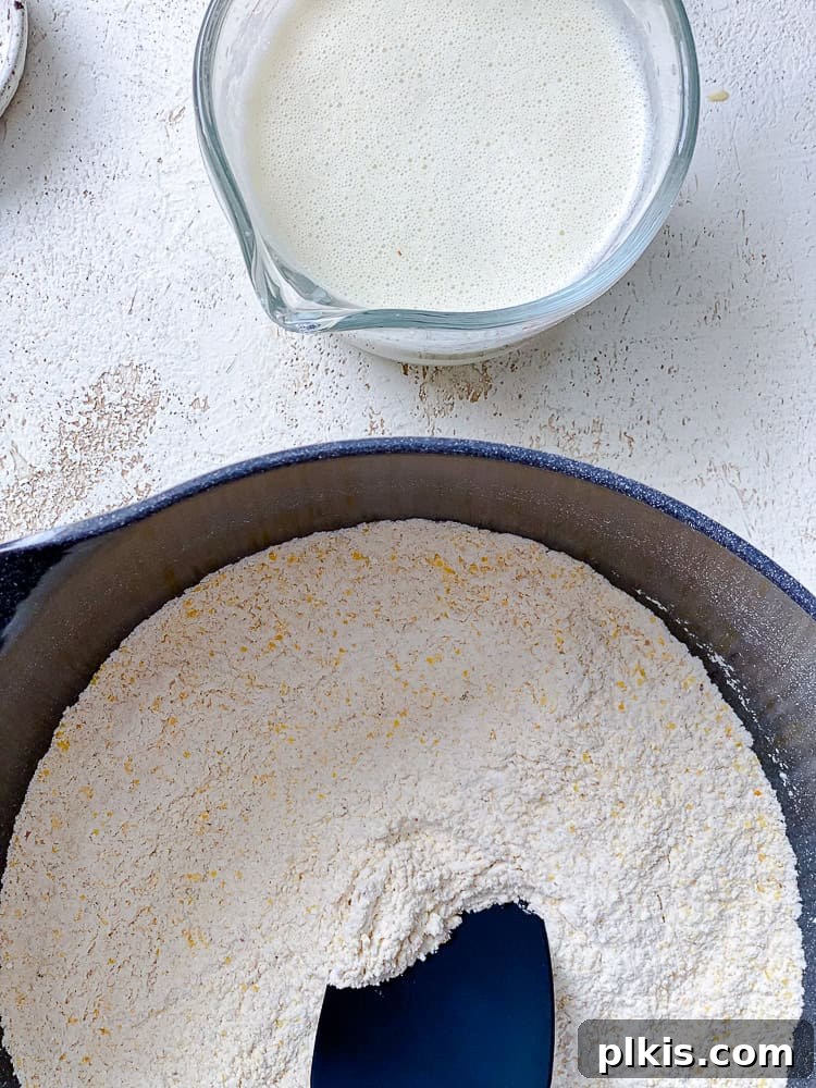 Zesty Jalapeño Cornbread 8 dry ingredients and wet ingredients for jalapeno cornbread in separate bowls.