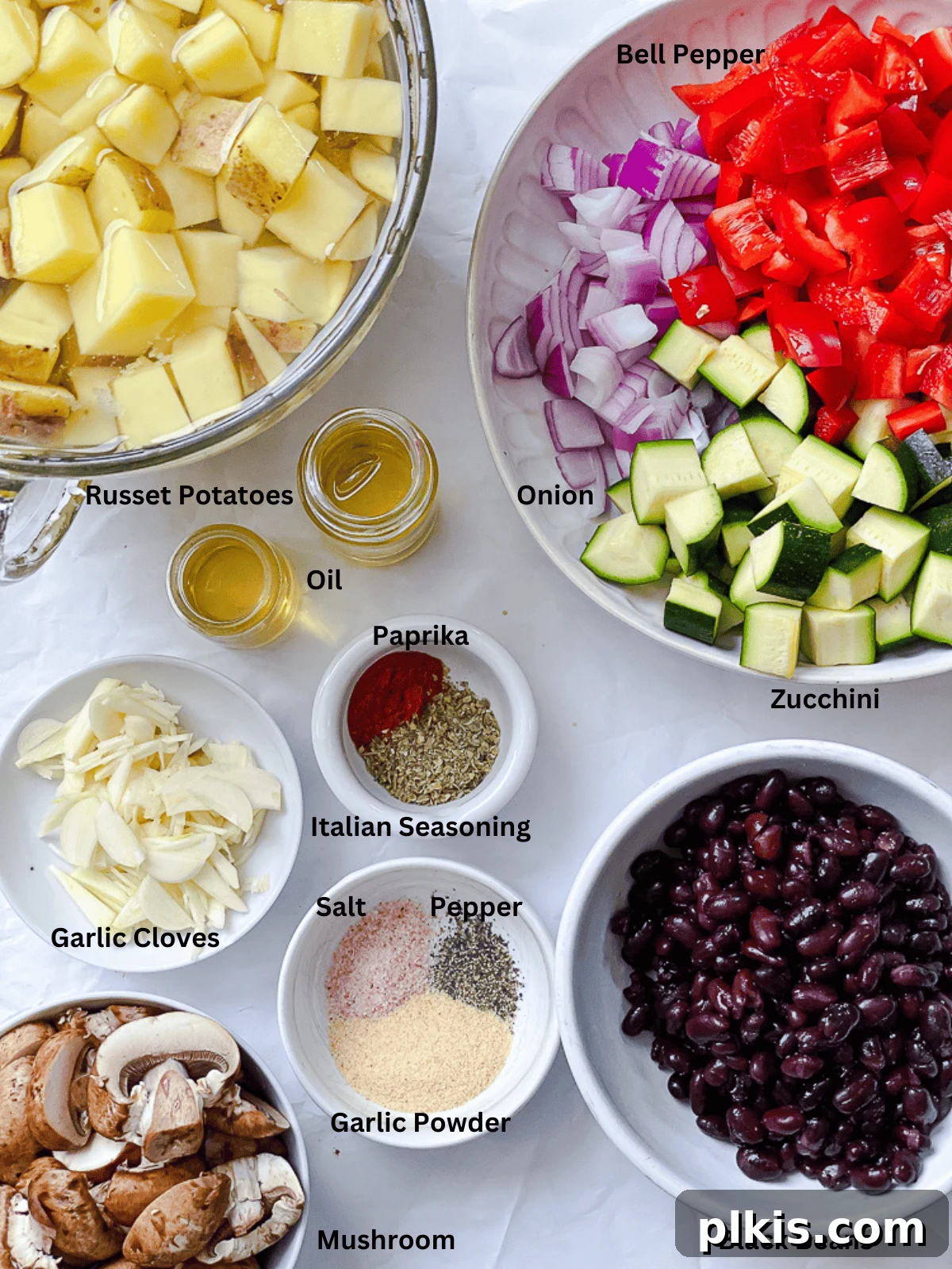 Ingredients for Breakfast Potato Hash [Roasted + Skillet] meticulously measured out and arranged on a clean white surface