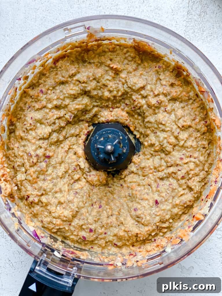 Ultimate Vegan Lentil Burgers 10 Post-processing of all burger mixture ingredients in a food processor.