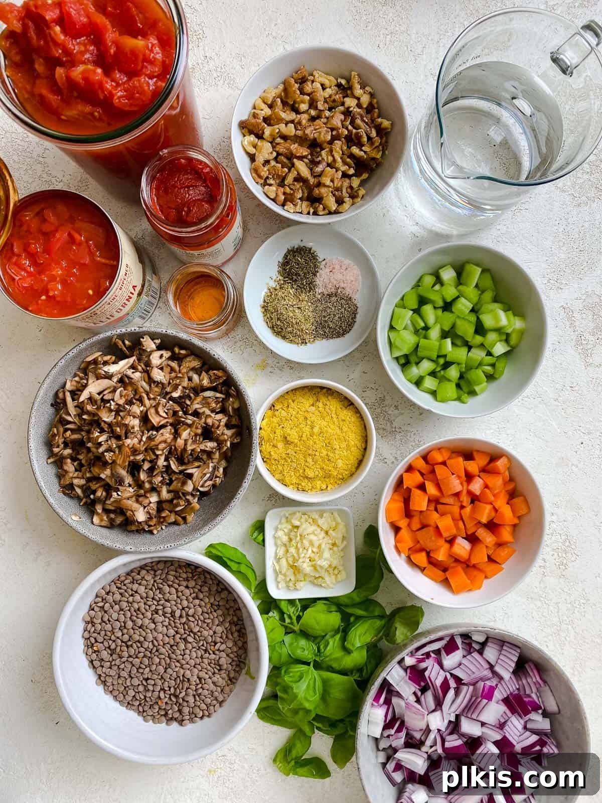 ingredients for Vegan Lentil Bolognese measured out against a white background