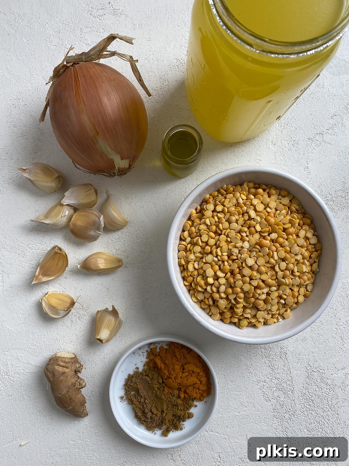 Sunshine in a Bowl: Easy Yellow Dal 3 ingredients for Easy Yellow Dal on a white surface