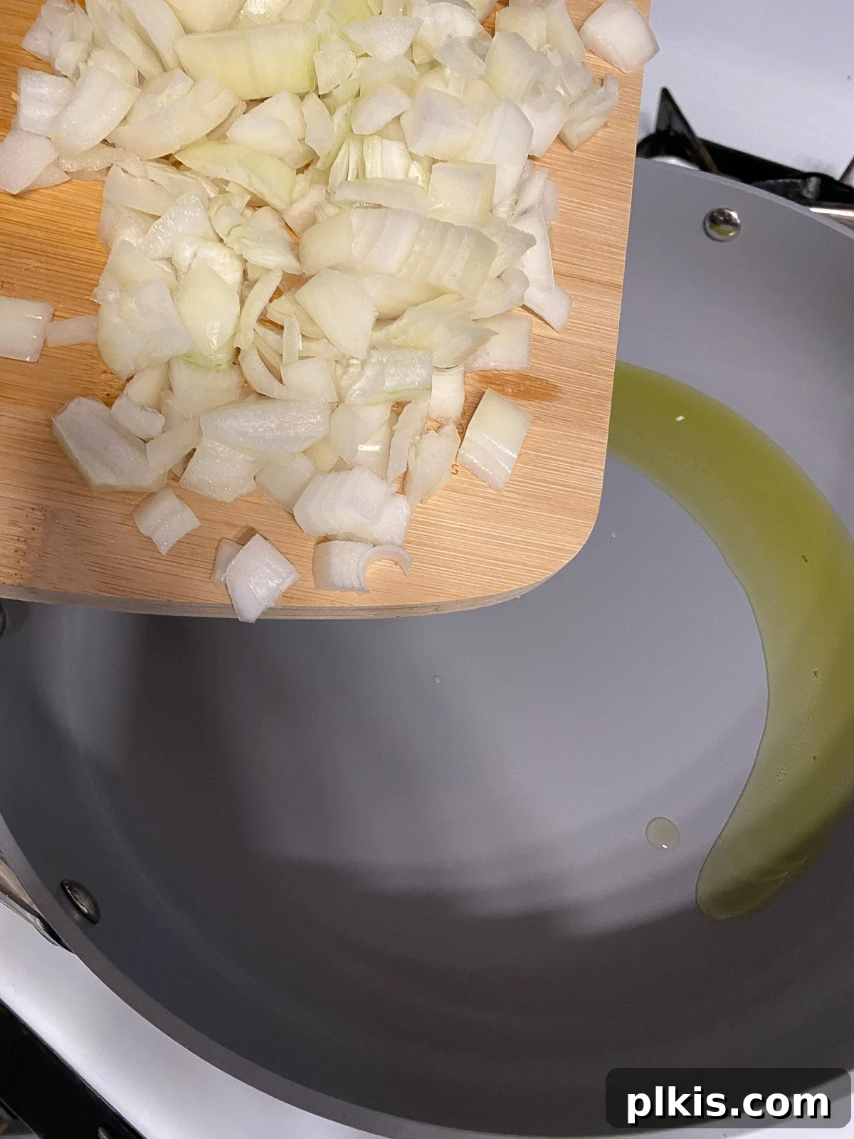 Sunshine in a Bowl: Easy Yellow Dal 5 process shot of diced onions added to pan
