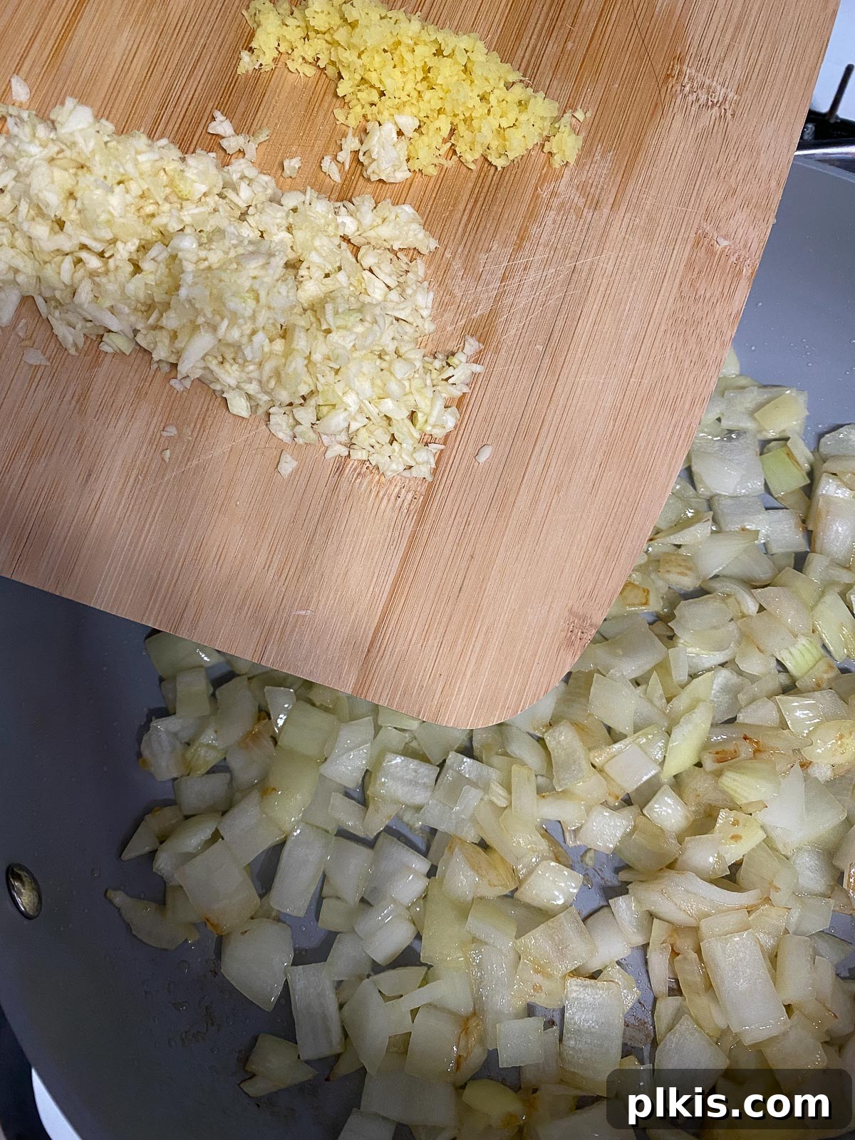 Sunshine in a Bowl: Easy Yellow Dal 6 process shot of ginger and garlic added to pan