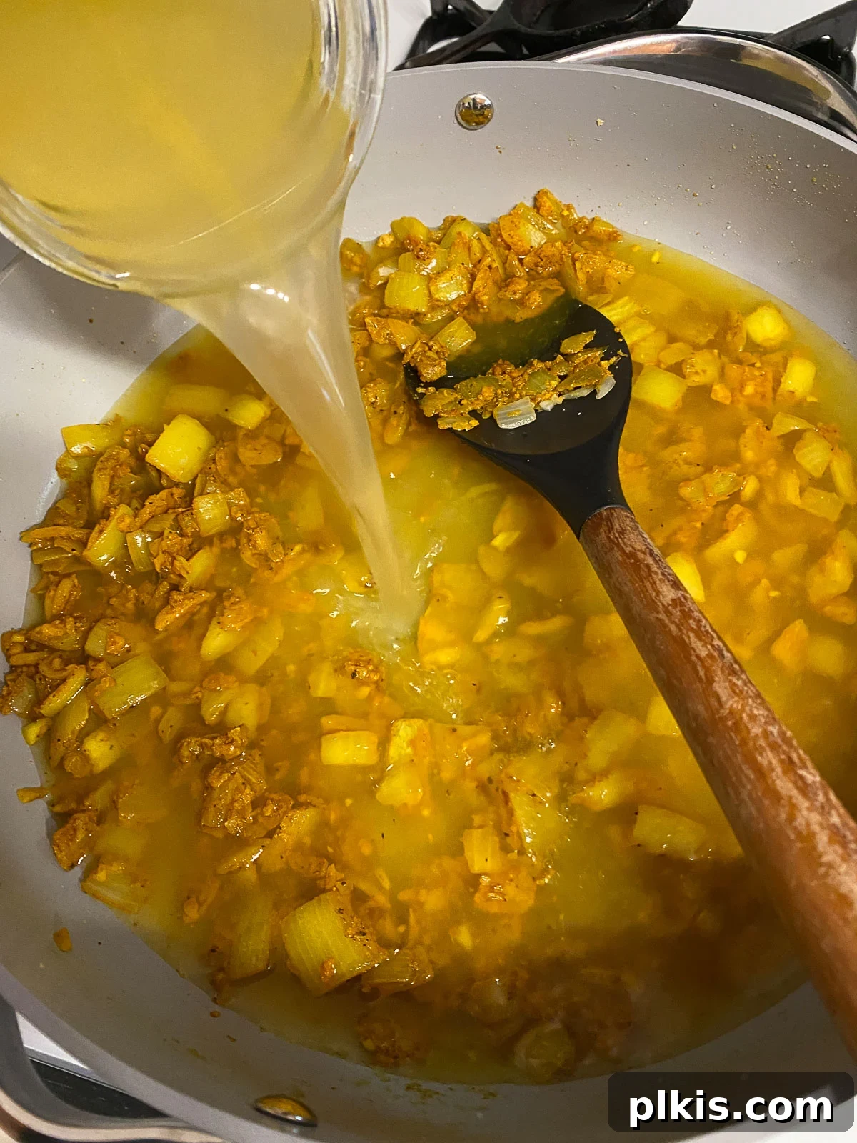 Sunshine in a Bowl: Easy Yellow Dal 10 process shot of veggie broth added to pan