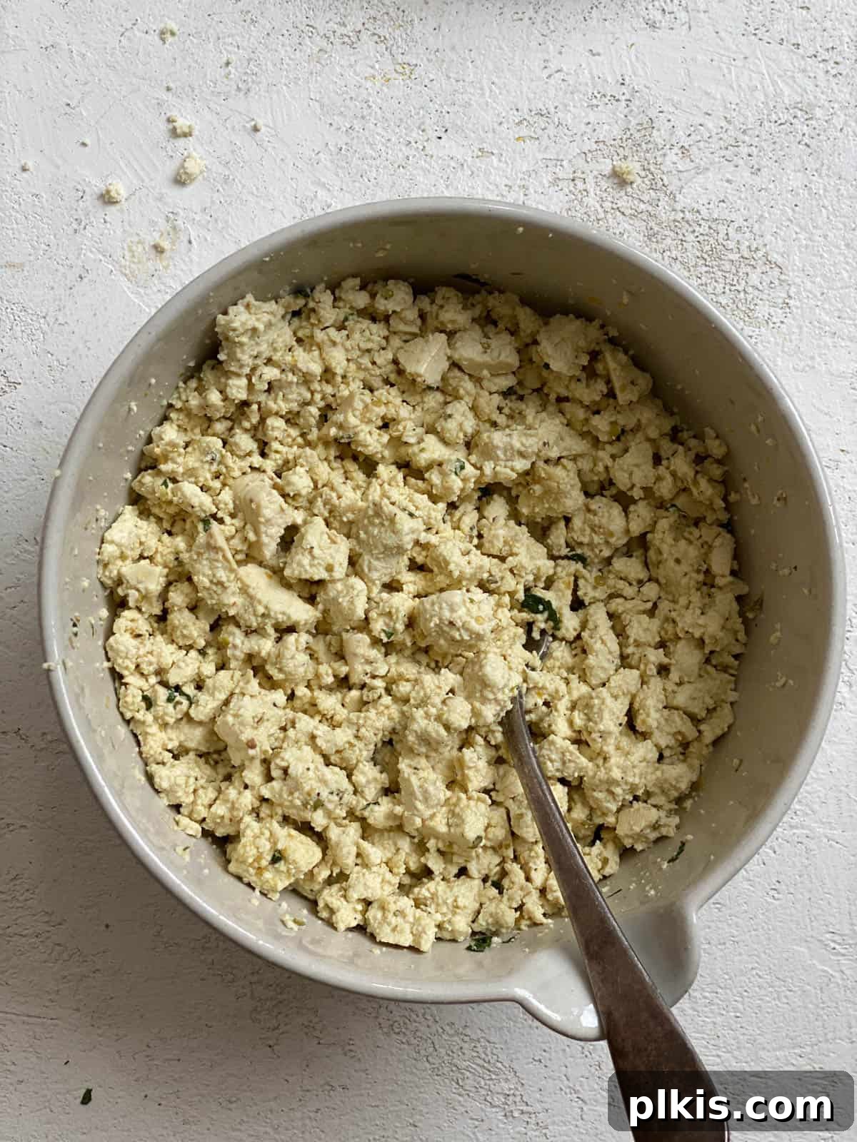 Autumn Pumpkin Pasta Shells with Aromatic Sage Cream 8 Mixed tofu ricotta filling in a bowl, showing its creamy texture