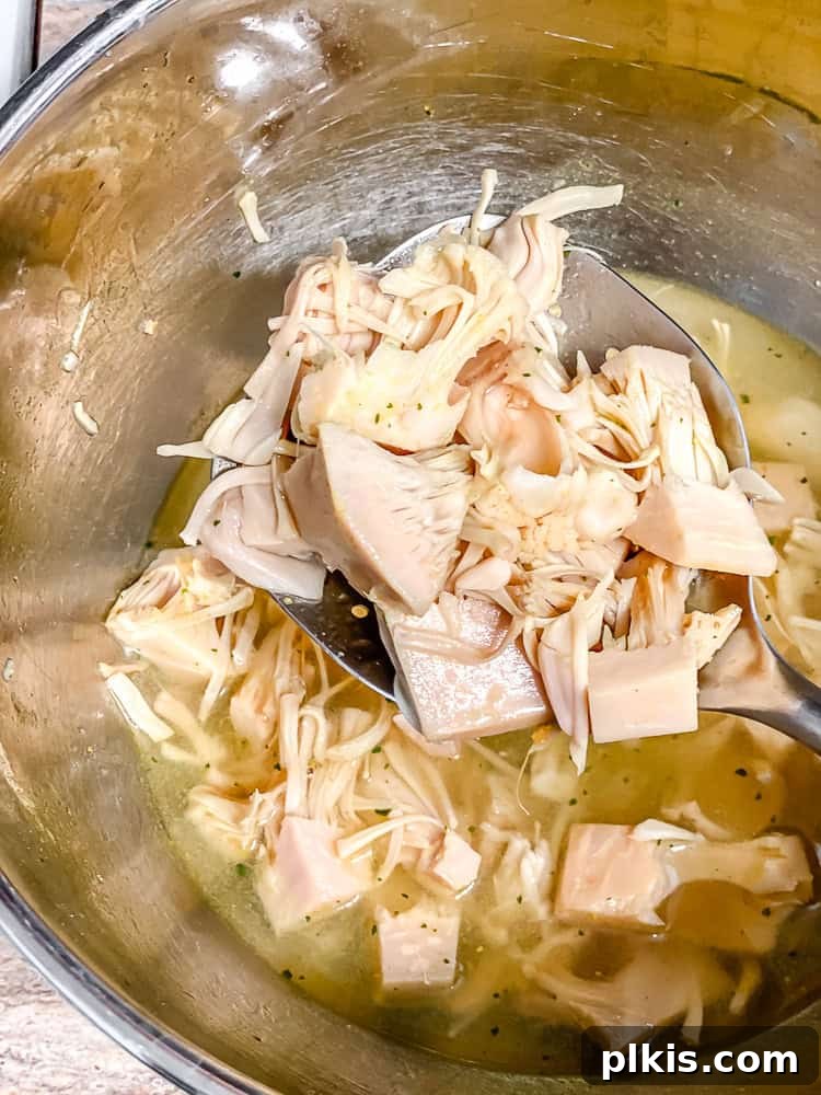 Pulled Jackfruit Noodle Soup 4 process shot showing jackfruit in mixing bowl