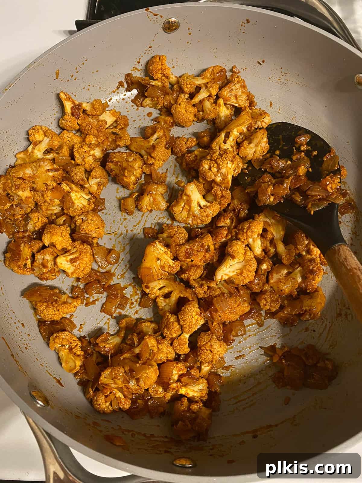 Roasted Cauliflower Tacos 11 The cauliflower, onions, and garlic cooking together in the pan, developing rich and aromatic taco flavors.