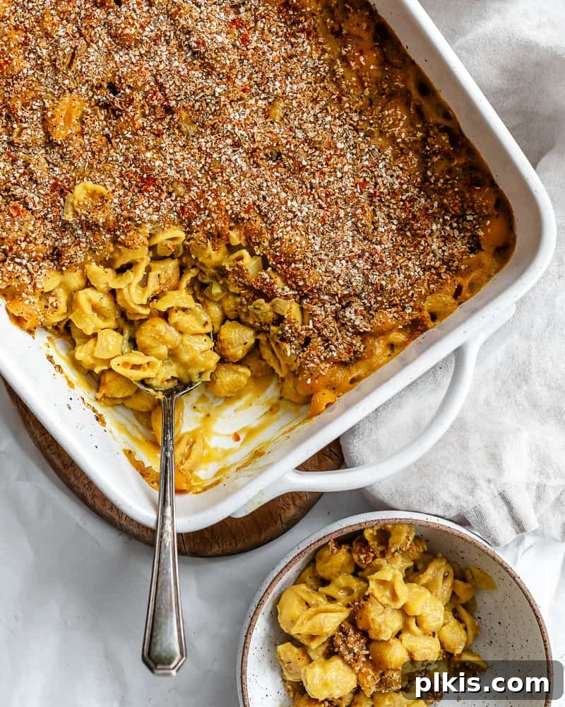 Ultimate Vegan Mac Bake 2 A vibrant golden-brown vegan baked mac and cheese dish, ready to serve.