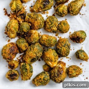 Effortless Vegan Brussels Sprouts Delight 14 completed Easy Vegan Brussels Sprouts scattered on a white surface