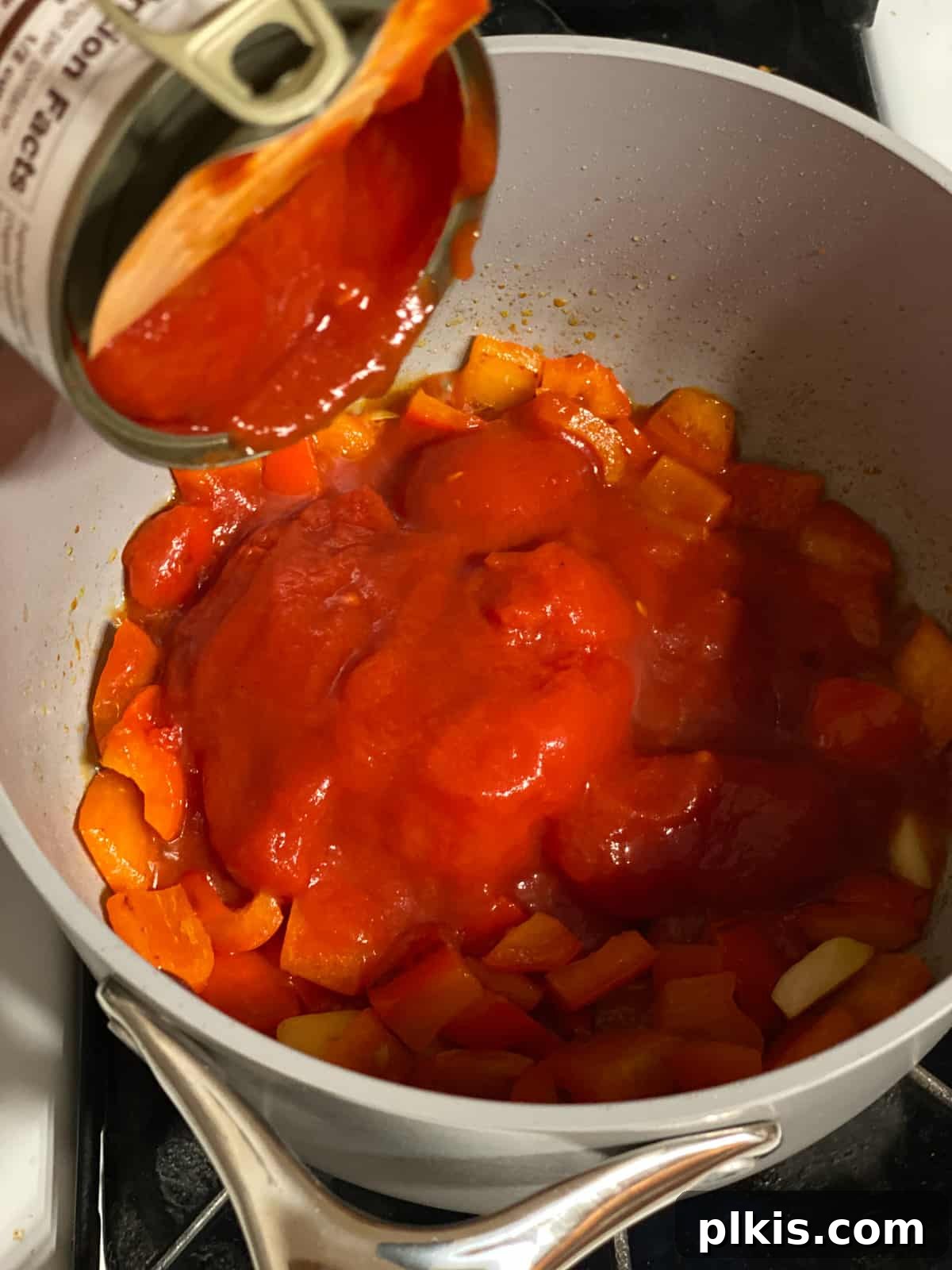 Pantry-Friendly Vegan Tomato Soup 6 Another process shot of tomatoes simmering in the pan.