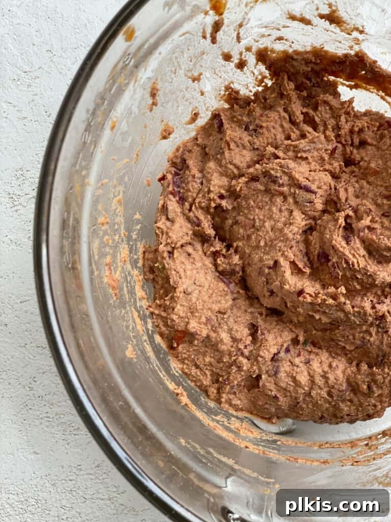 Quick-Fix 4-Ingredient Vegan Burgers 10 Process shot of the fully mixed vegan burger ingredients in a bowl, ready for forming patties