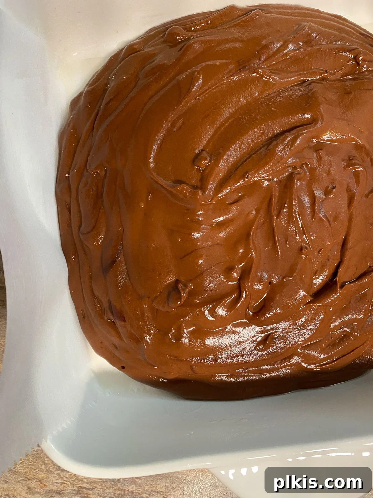 Decadent Vegan Sweet Potato Brownies 11 post pouring Sweet Potato Brownie mixture into white baking tray