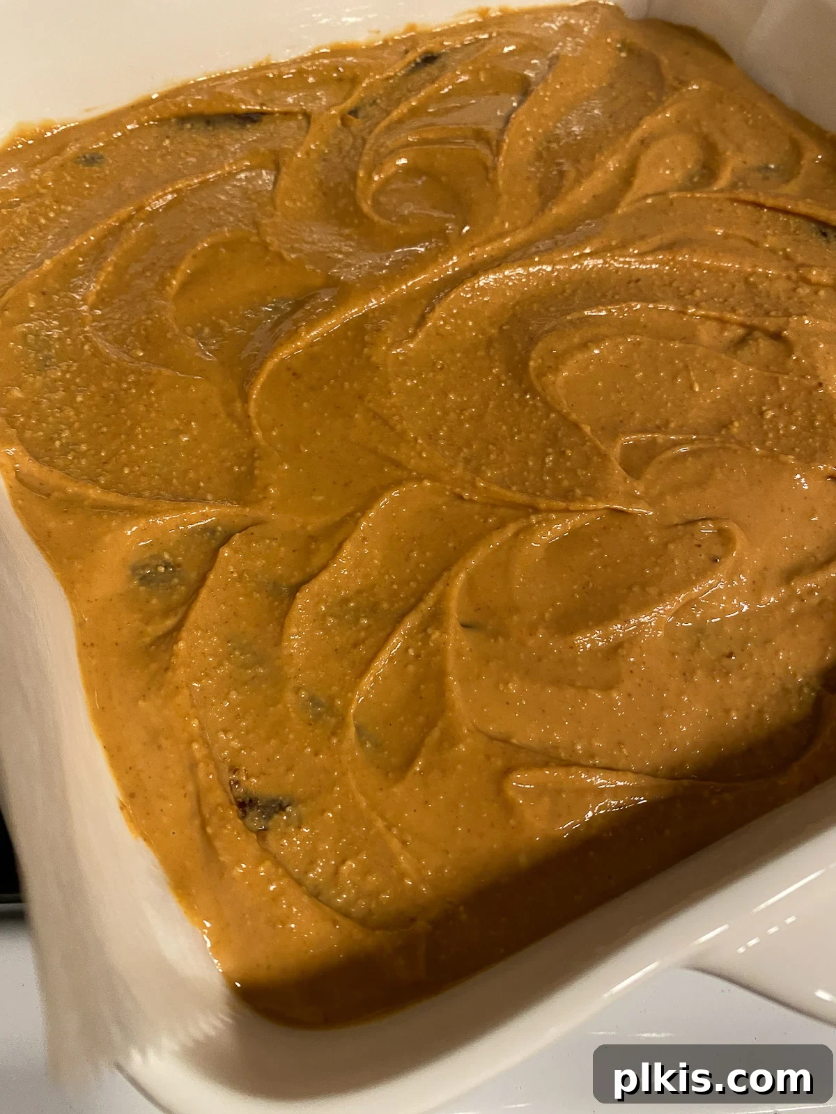 Decadent Vegan Sweet Potato Brownies 13 post spreading of peanut butter onto brownie mixture