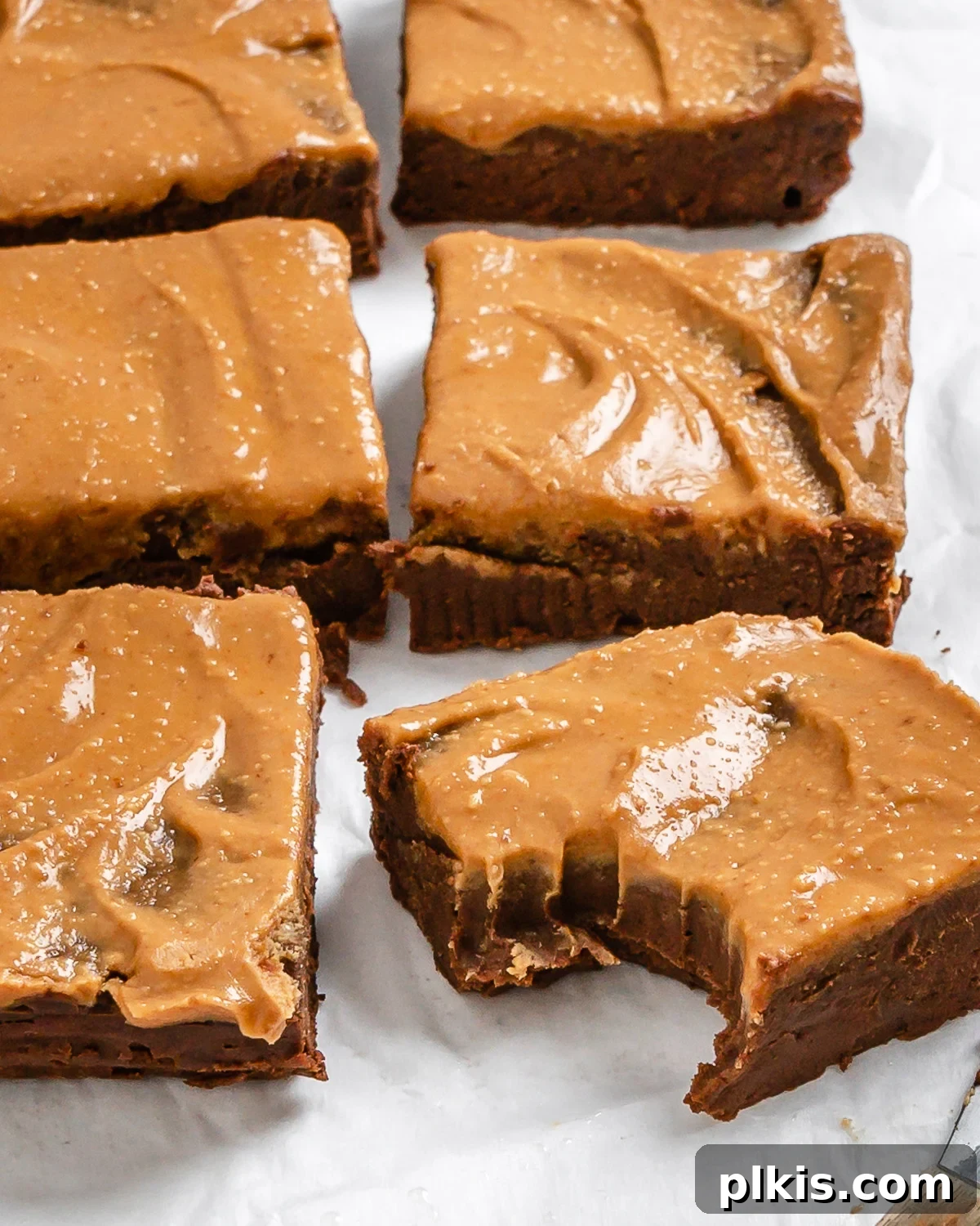 Decadent Vegan Sweet Potato Brownies 15 close up of Sweet Potato Brownie mixture with a bite missing from one brownie