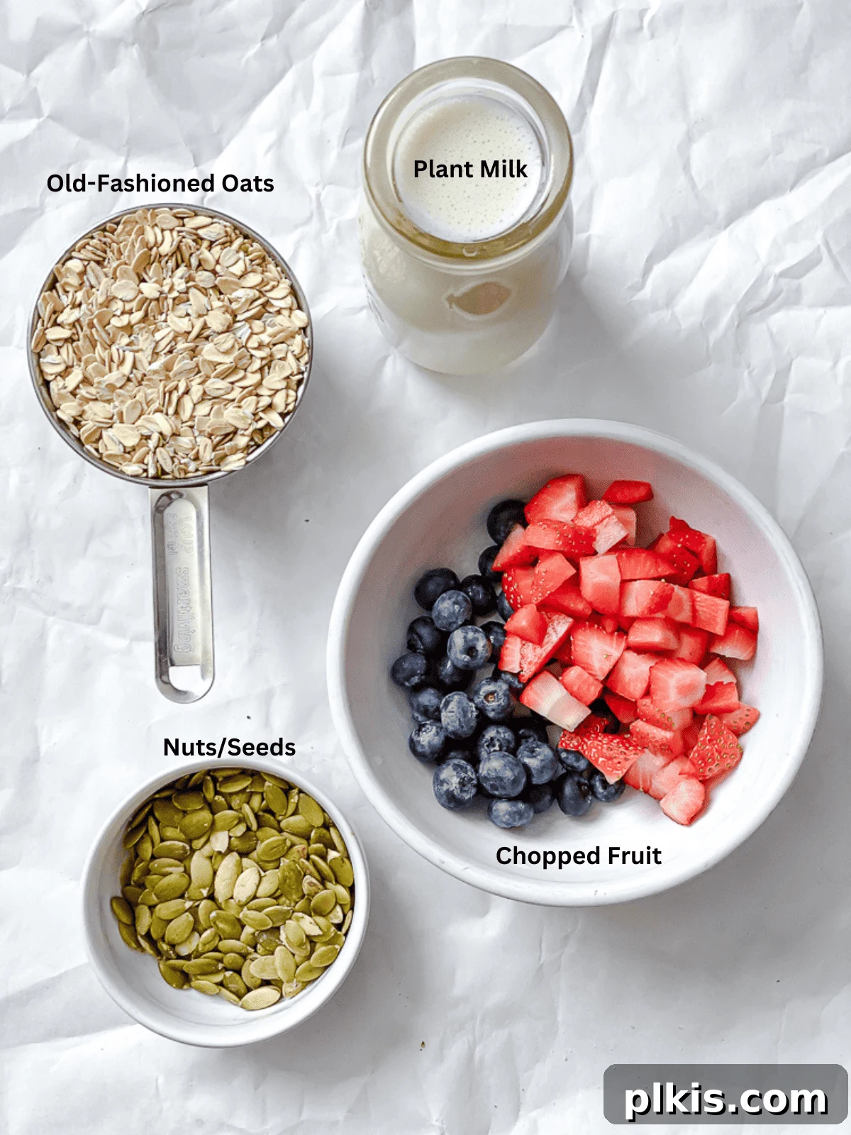 Vegan Overnight Oats: Endless Flavor Possibilities 3 Ingredients for Vegan Overnight Oats measured out on a white surface