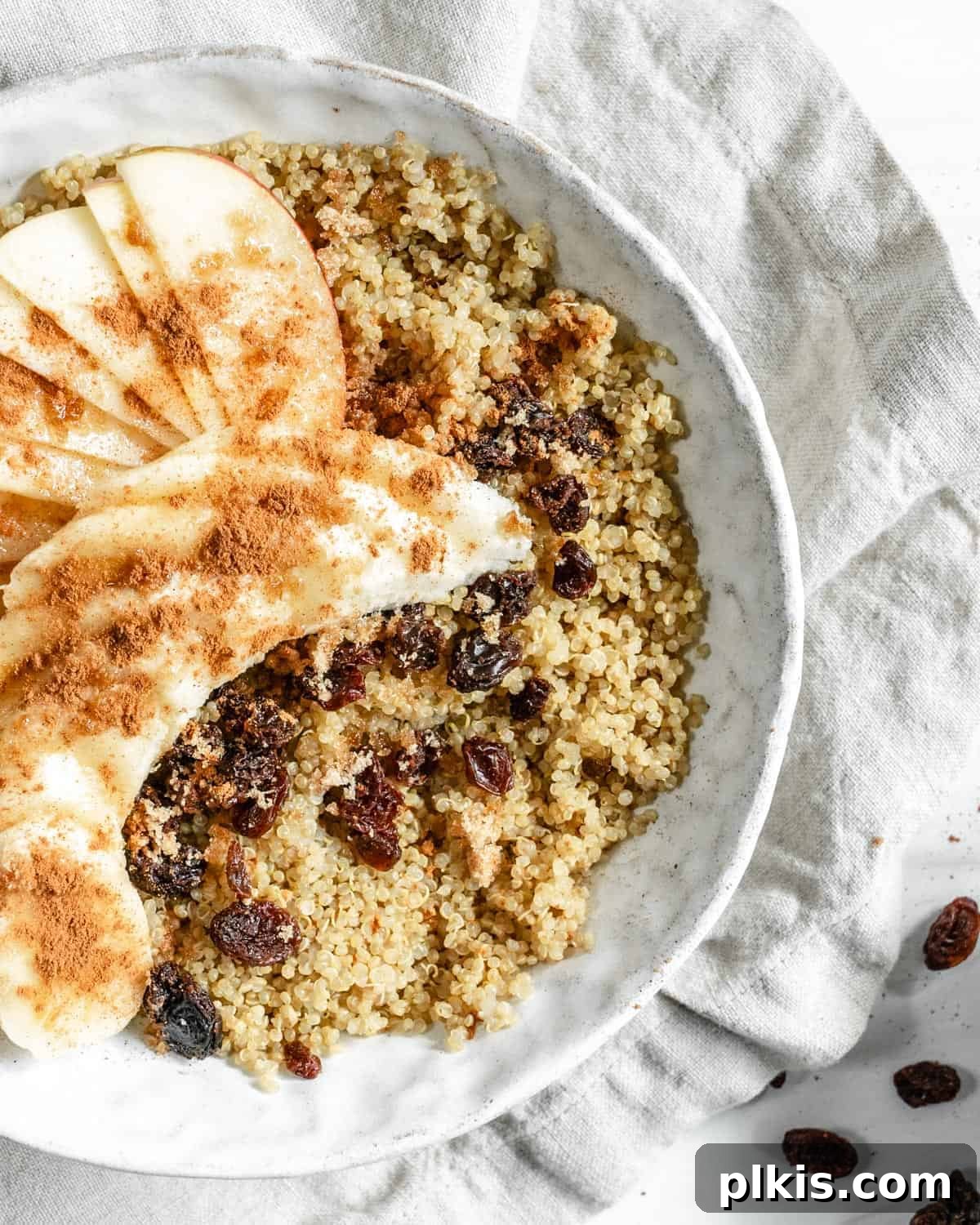 Warm Apple Quinoa Breakfast 6 A final shot of the completed Breakfast Quinoa Apple Bowl, beautifully garnished and ready to eat, with a warm and inviting feel