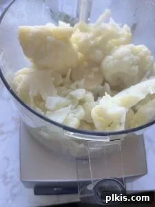 Creamy Vegan Mashed Cauliflower Keto Low Carb 4 process showing cauliflower in container